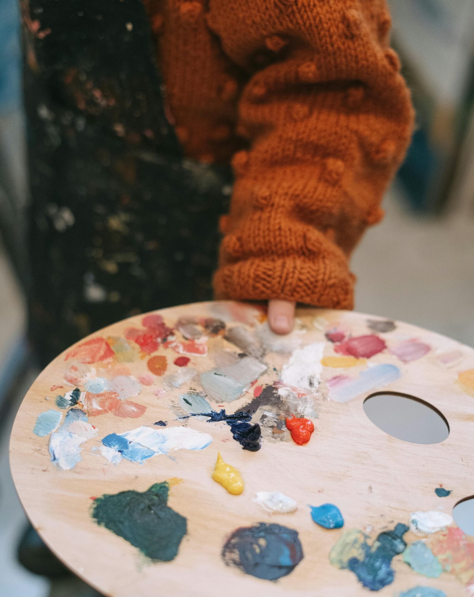 Child holding paint