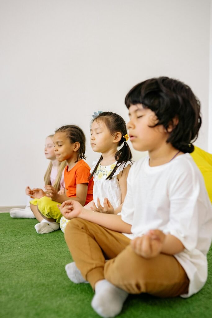 Confident children meditating